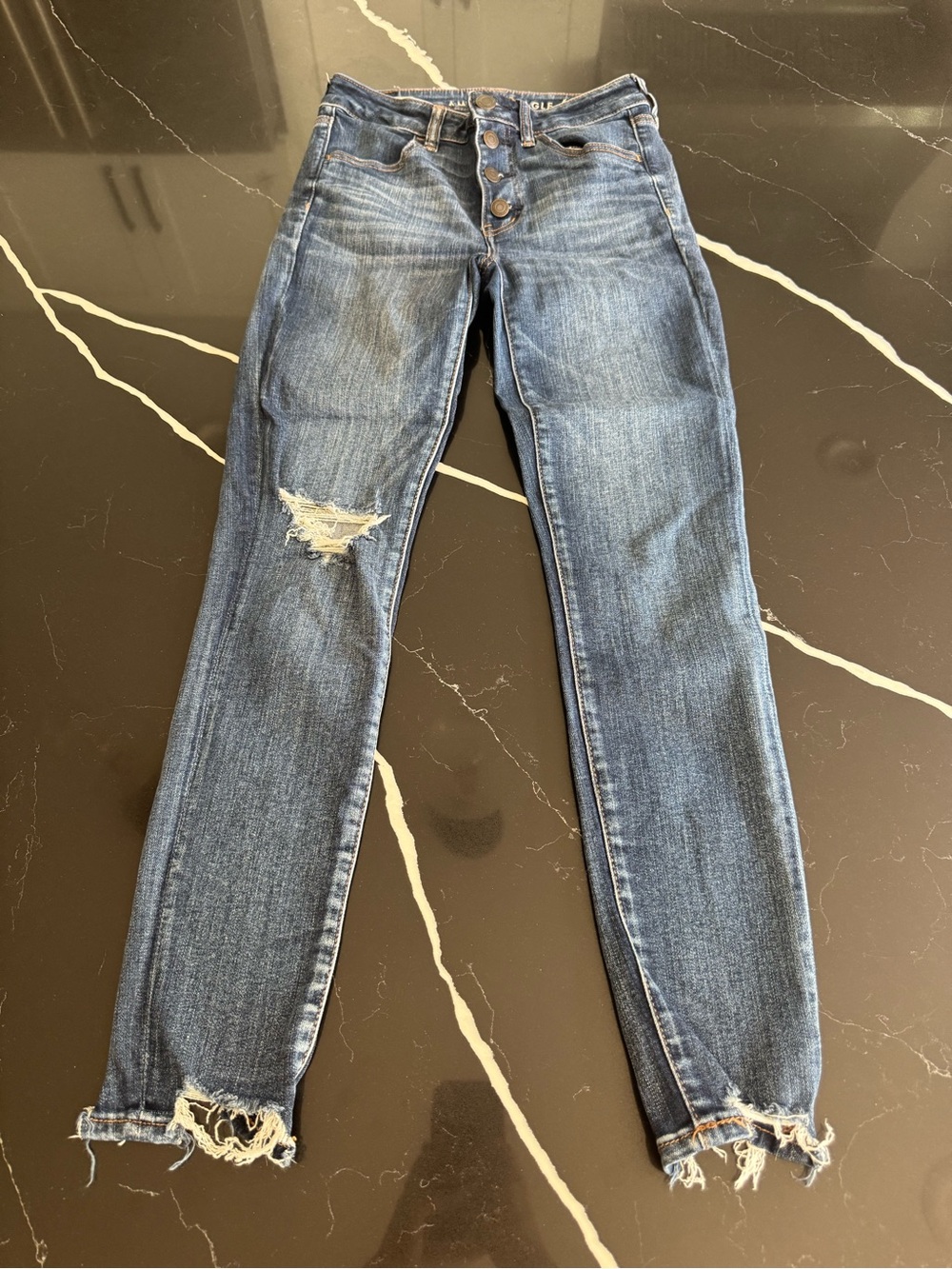 American Eagle Outfitters Women's Dark Blue Skinny Jeans with Distressed Hem